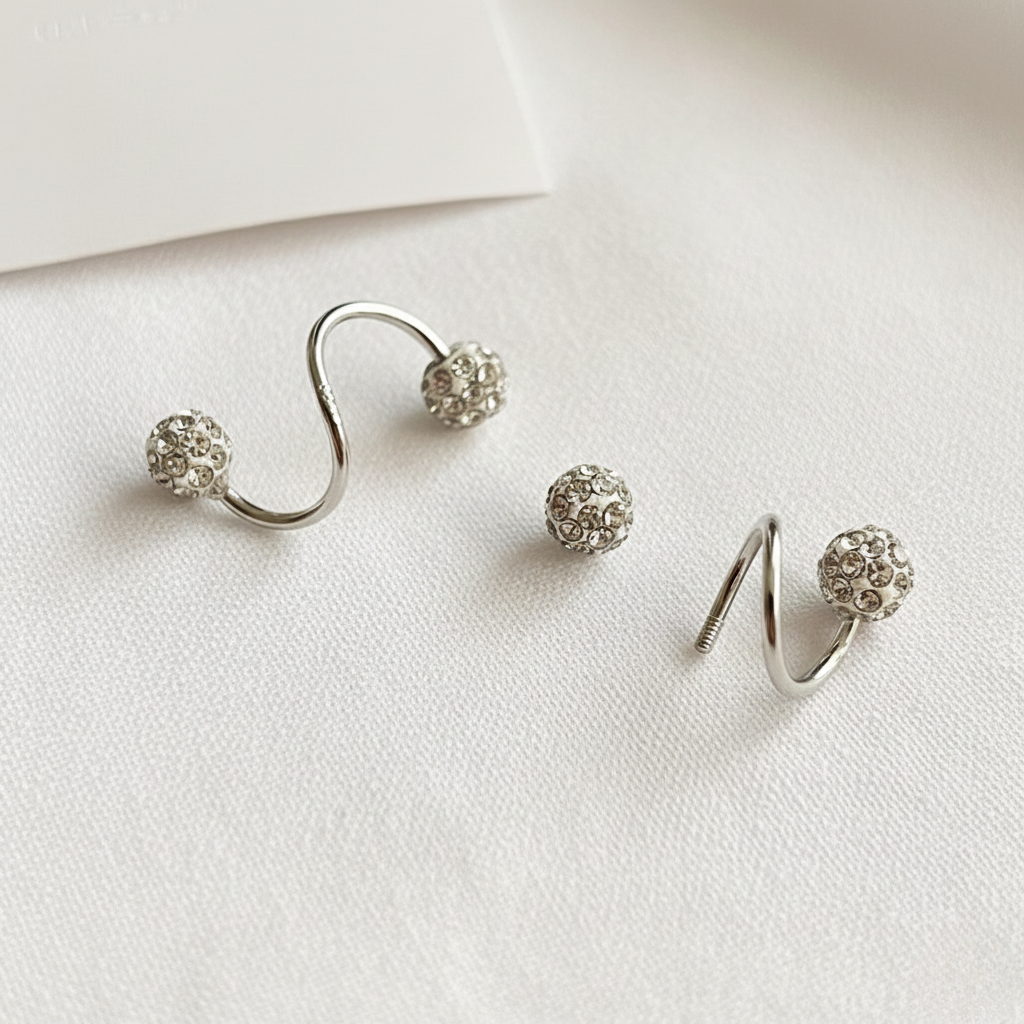 Aurelis Damen Spiral-Ohrstecker Silberfarbe Kristall Kugeln Double Look Twister Paar